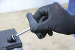 Dispositivo de giro del tapon de la bateria con mango en T